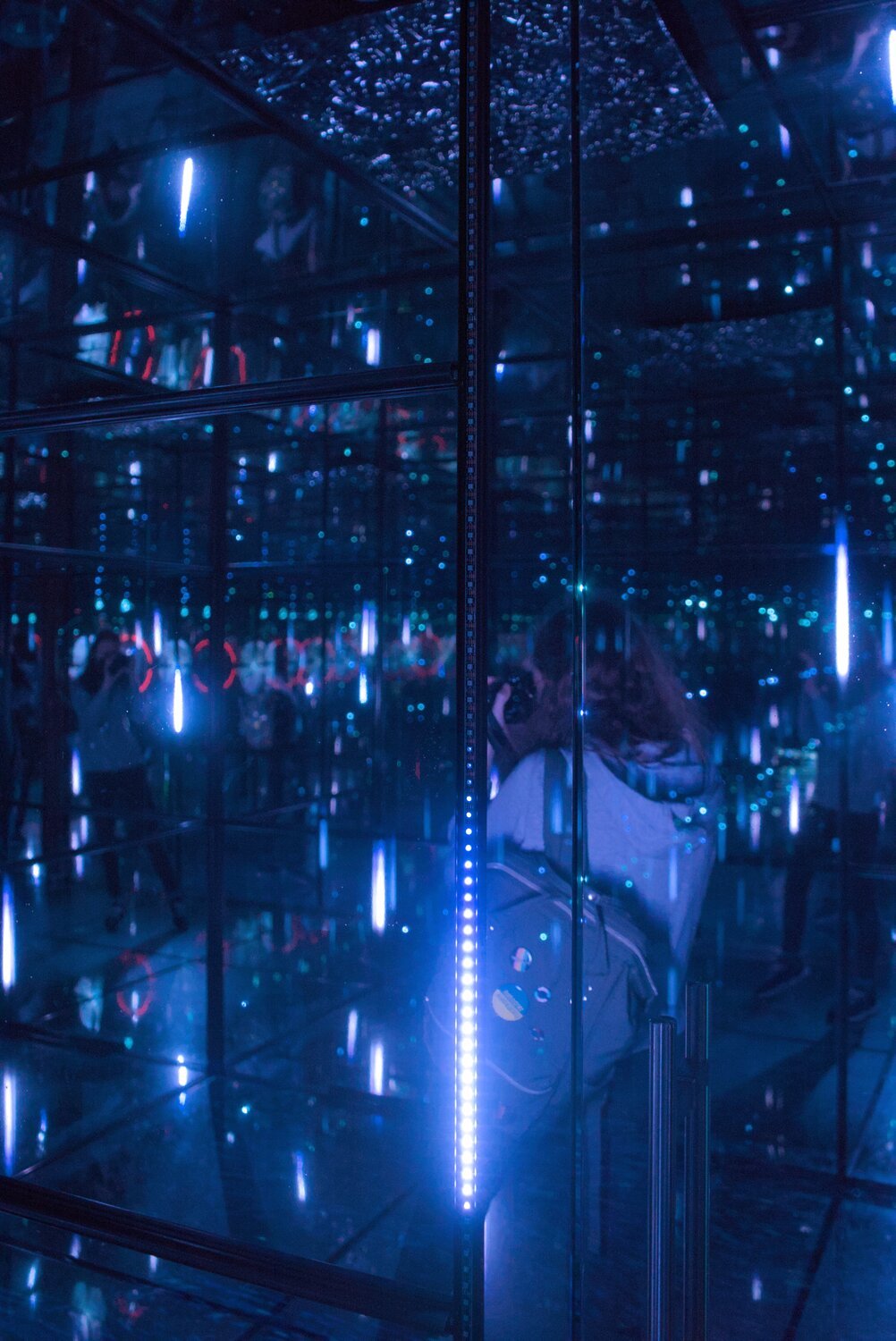 @xyla@shitpost.trade ghostly form, reflected into cyan infinities beyond