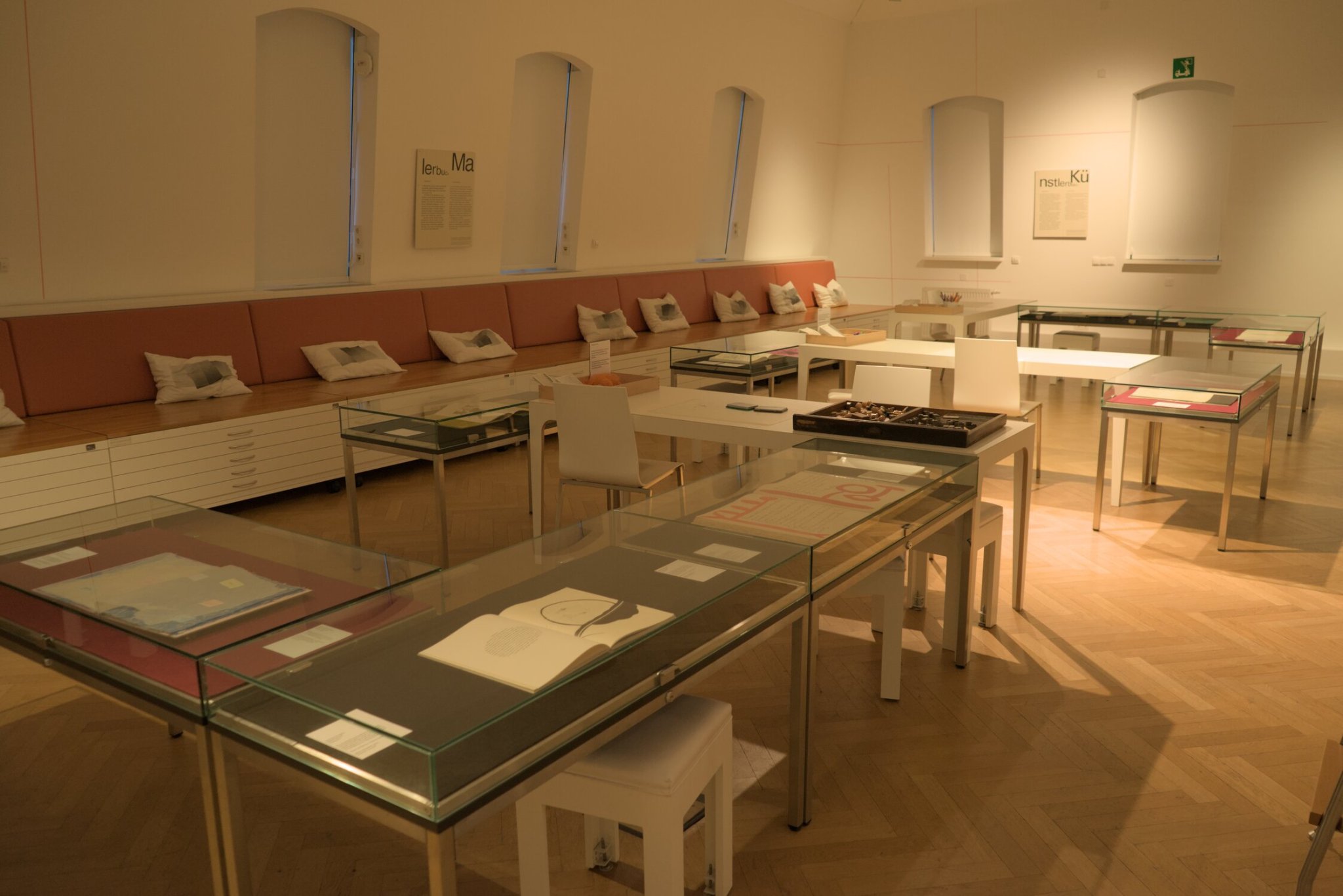 a museum exhibit, displaying books and typefaces of various kinds