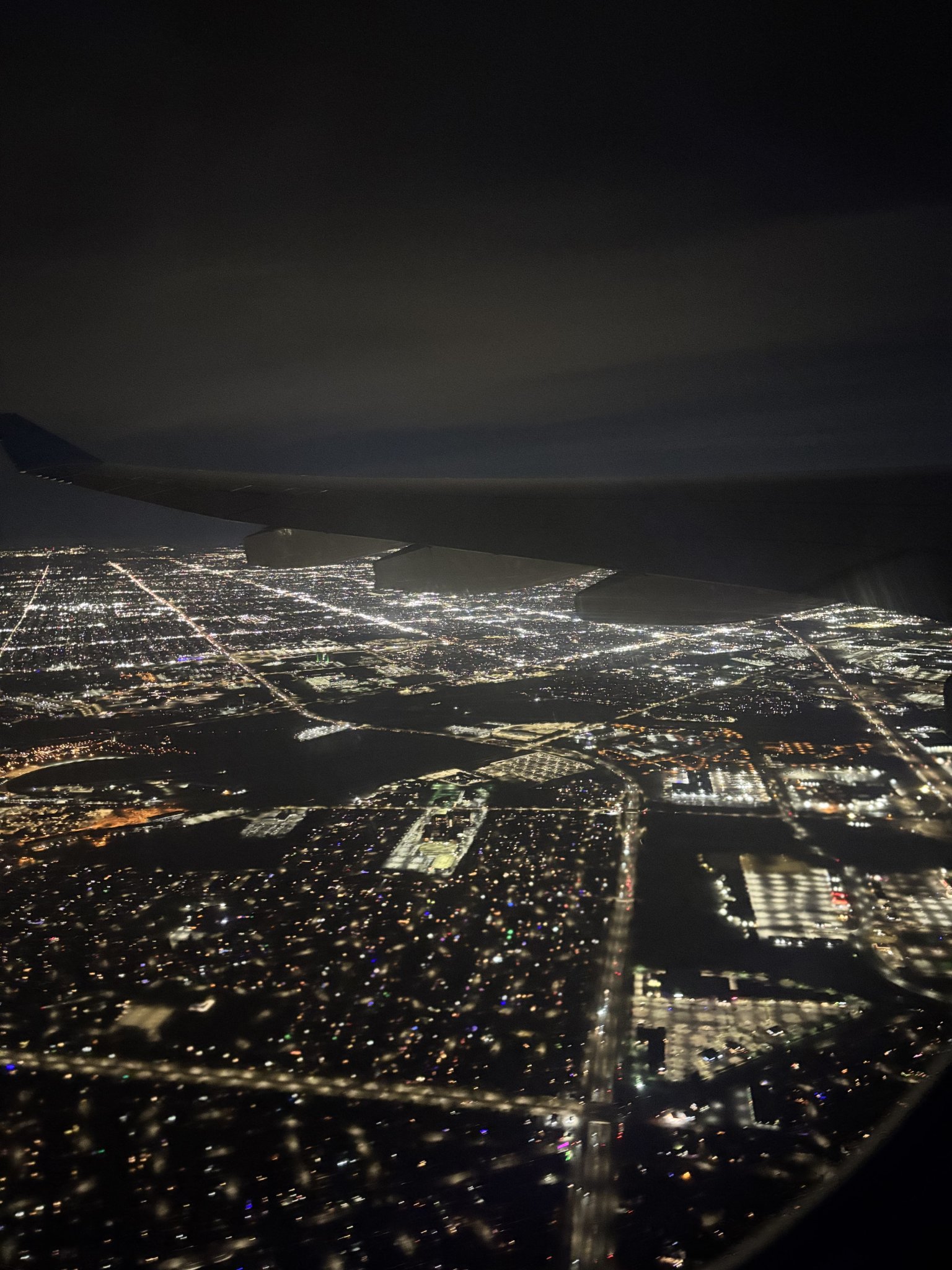 high above some city, we look down upon the lights
the light points aren't as sharp as they could be, having been taken from a phone...