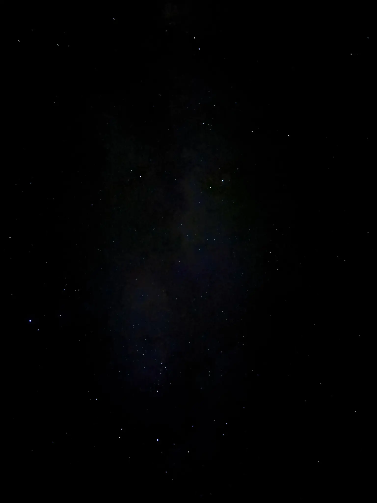 a field of stars, as taken by my phone.. beyond the stars space dust can be seen