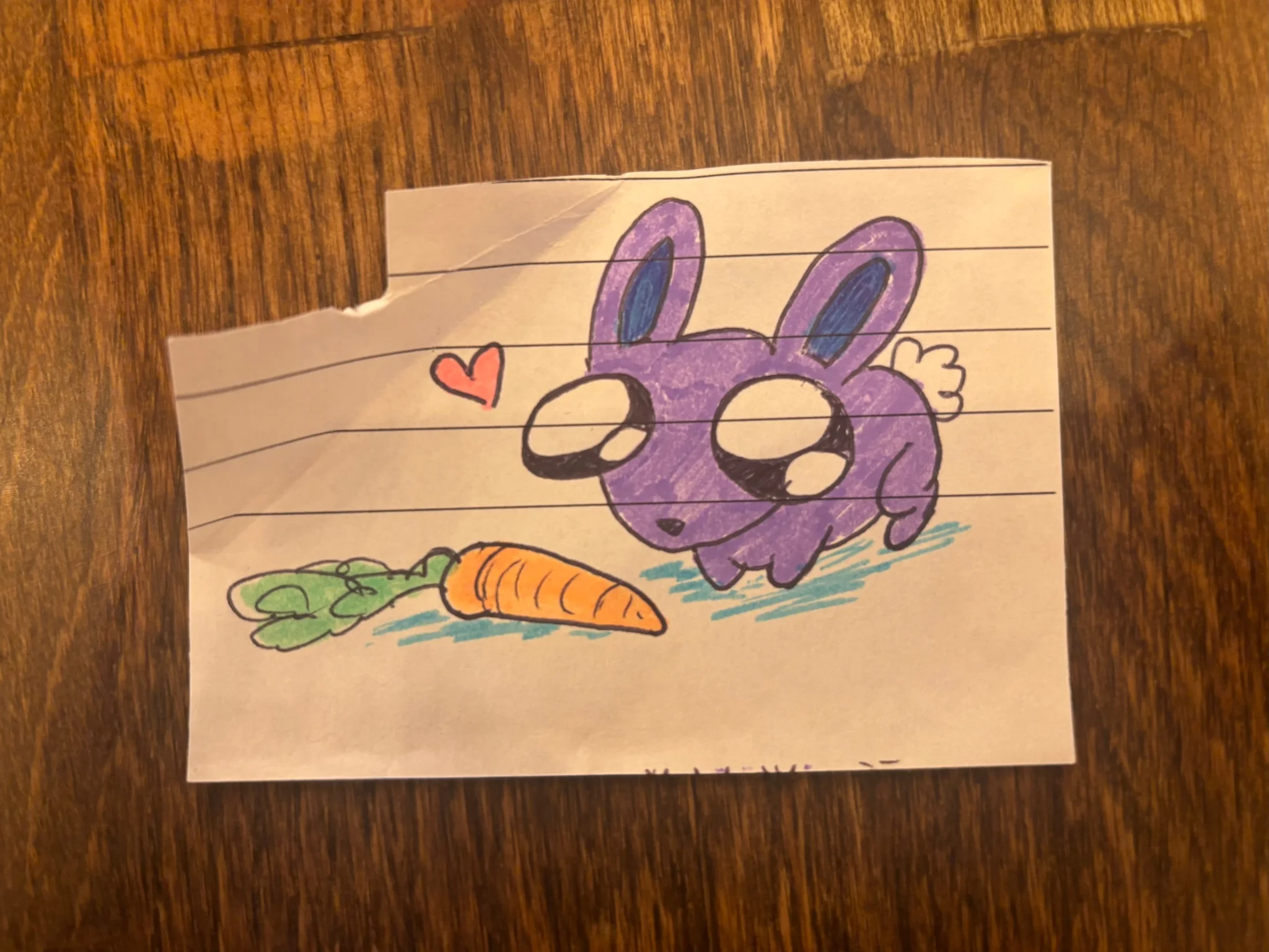 a small purple bunny with large anime eyes stands behind a carrot, emitting a heart in this simple line drawing