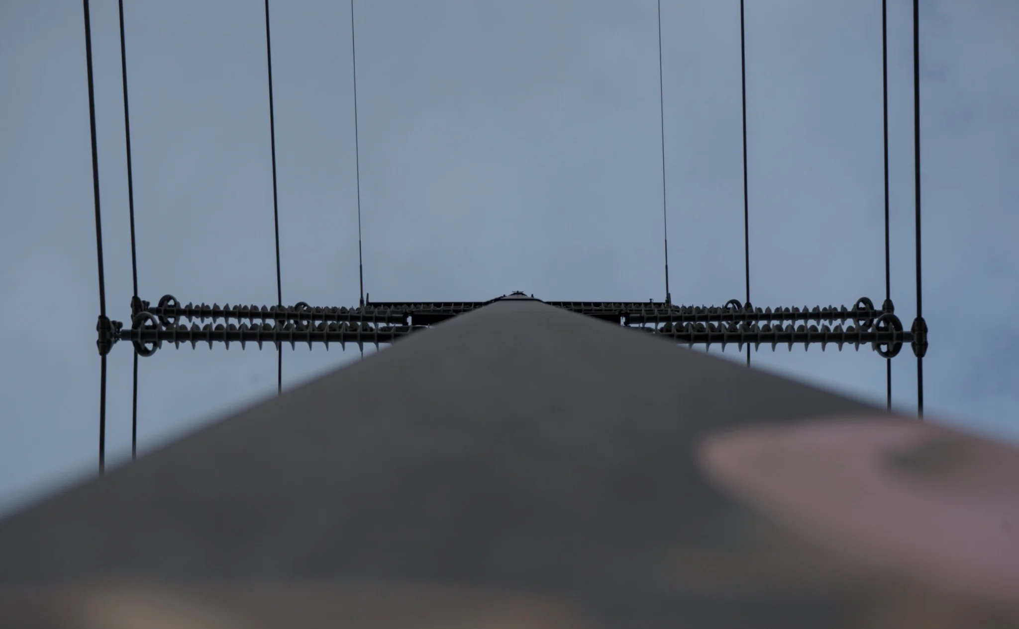 high voltage power pole, looking up from the bottom, the camera's bottom touching the pole
