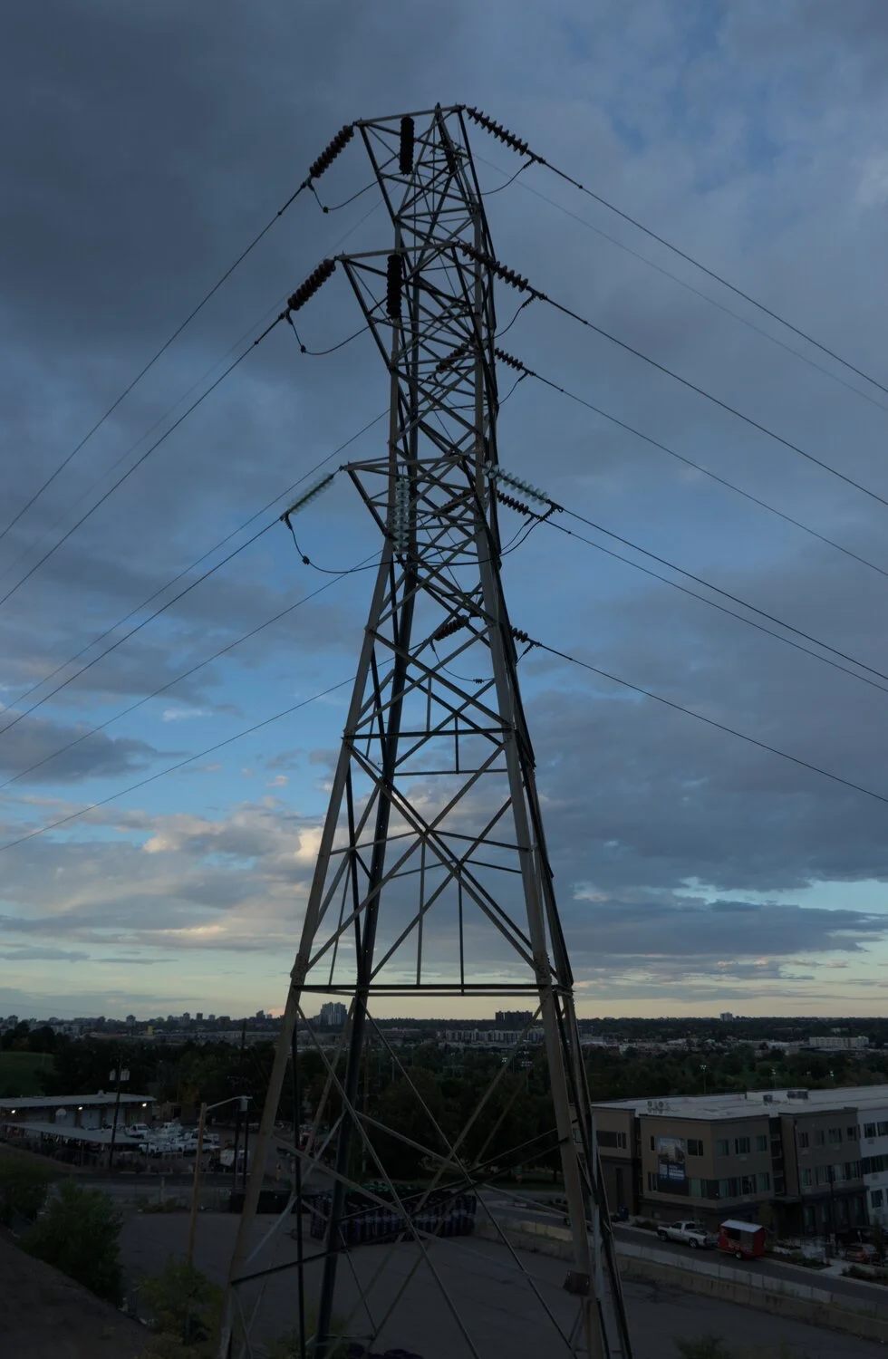 a high voltage transmission tower, as viewed from the side