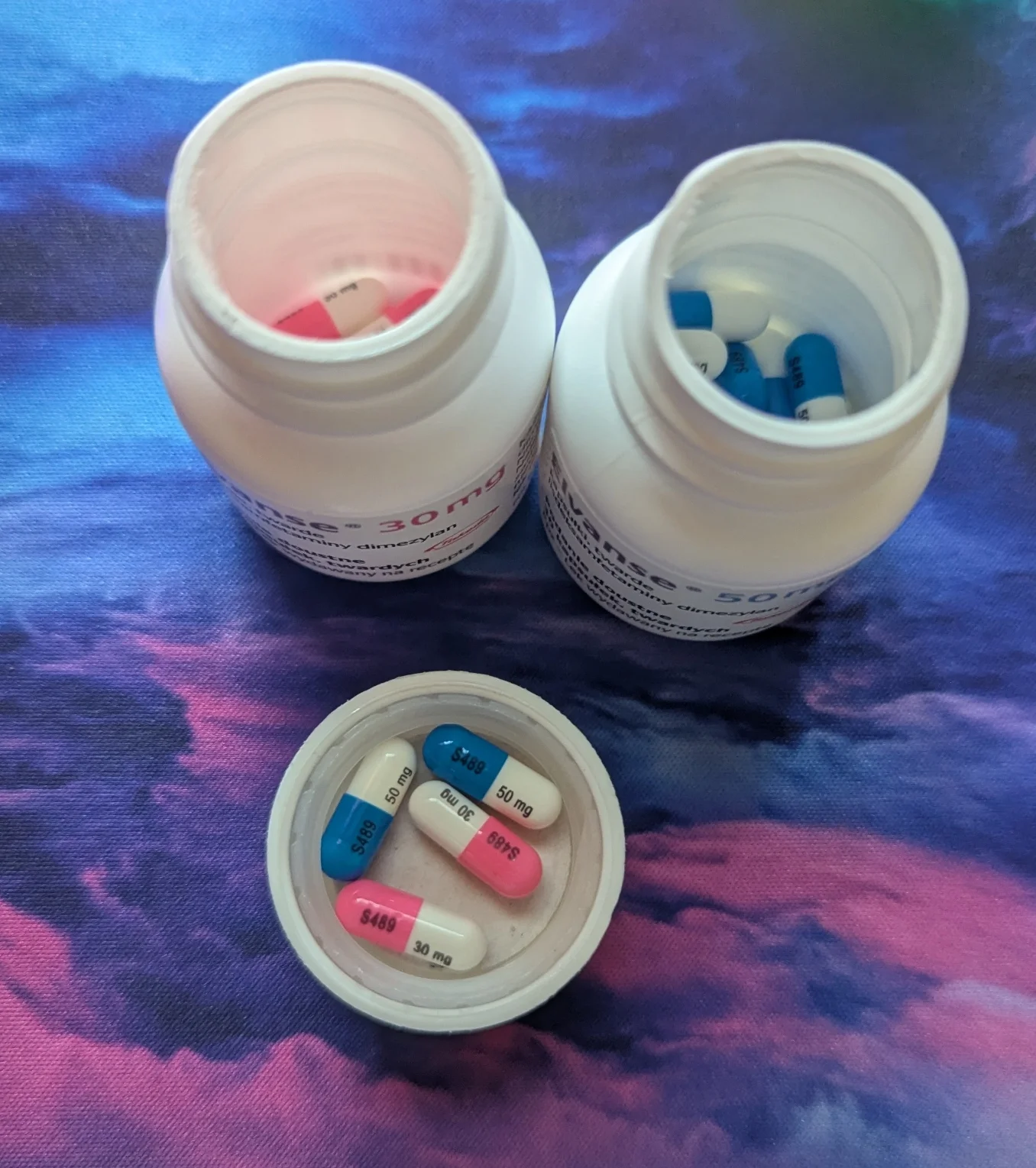 elvanse 30mg (hot pink) and 50mg (deep blue) right next to each other